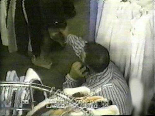 man_taking_upskirt_photo_01