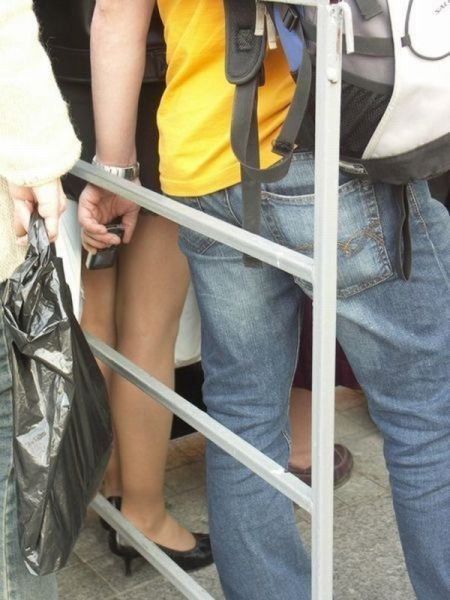 man_taking_upskirt_photo_11